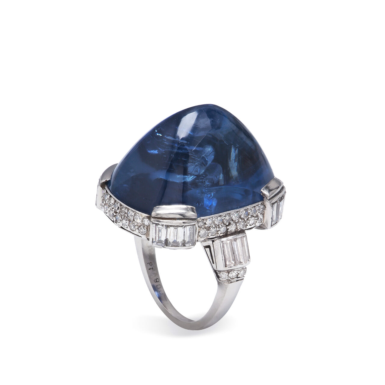 Bulgari ring in platinum with sugar loaf cut Ceylon sapphire and diamonds.